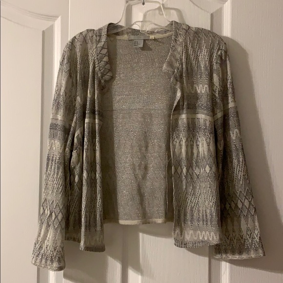 Shrug - Picture 1 of 1